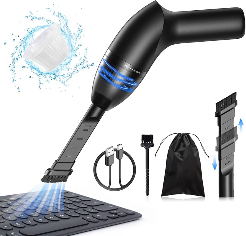 Mini keyboard vacuum with 4,300Pa suction for laptops, desks, and smal